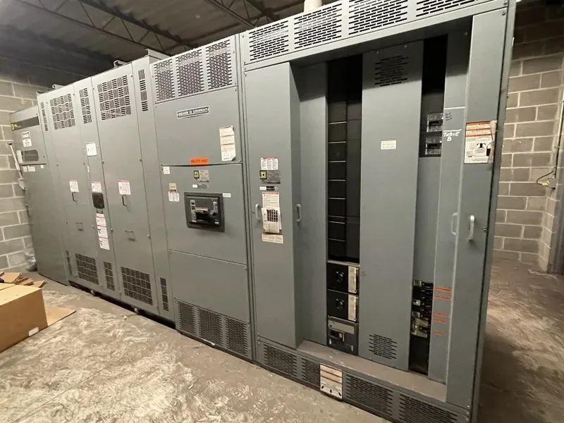 Medium-voltage switchgear line-up staged in a warehouse — Columbus, OH
