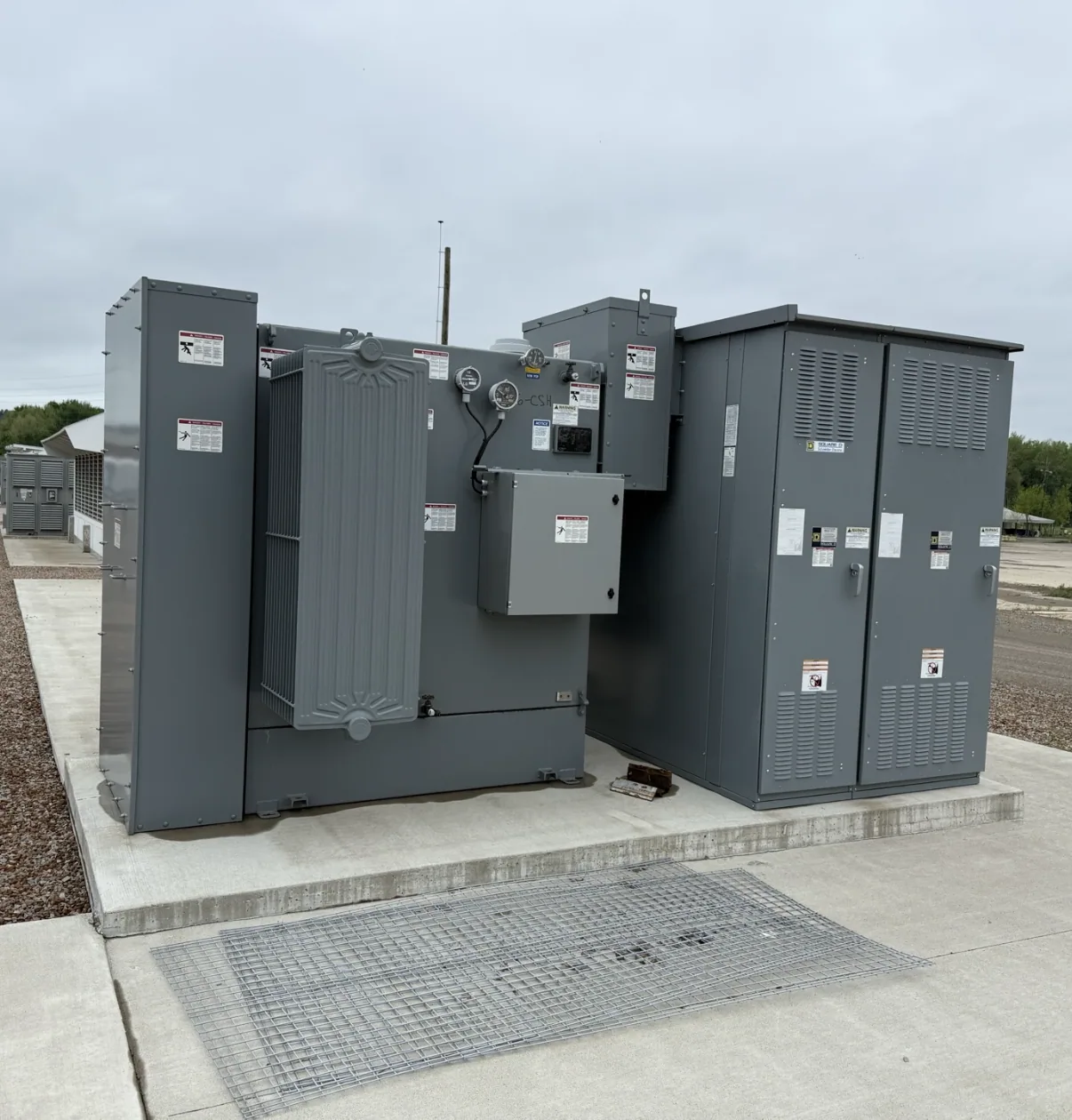 Pad-mount transformer and switching cabinet on a finished pad — Grand Rapids, MI